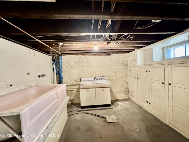 below grade area with washer / clothes dryer