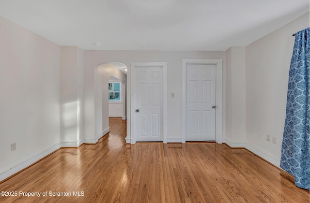 unfurnished bedroom featuring light hardwood / wood-style flooring