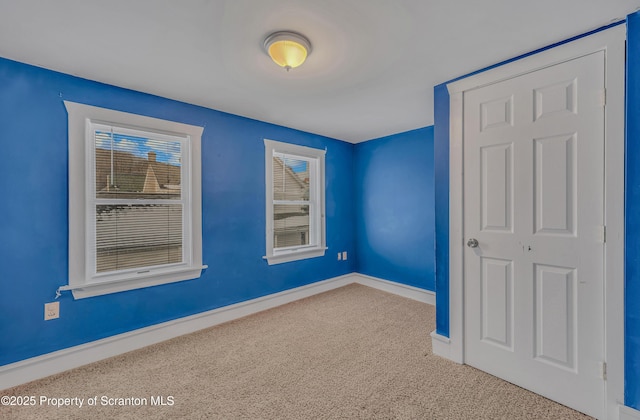 view of carpeted spare room