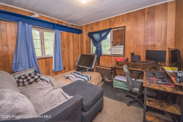 carpeted office featuring cooling unit and wooden walls