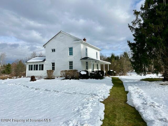 view of snowy exterior