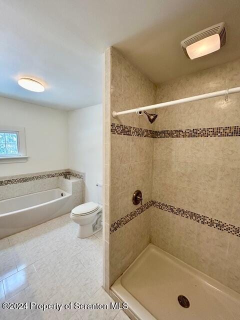 bathroom with plus walk in shower, tile patterned floors, and toilet