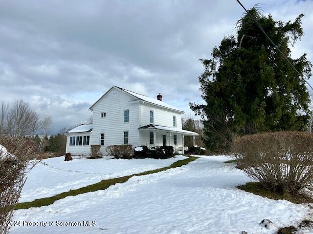 view of snowy exterior