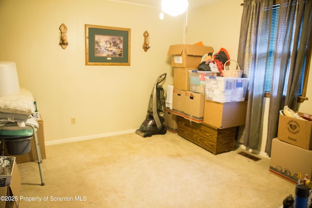 interior space featuring light colored carpet