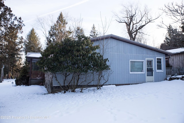 view of snow covered property