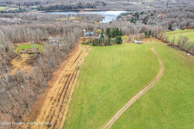 aerial view with a rural view and a water view