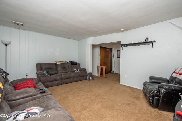 carpeted living room featuring visible vents