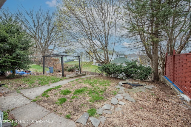 view of yard with fence