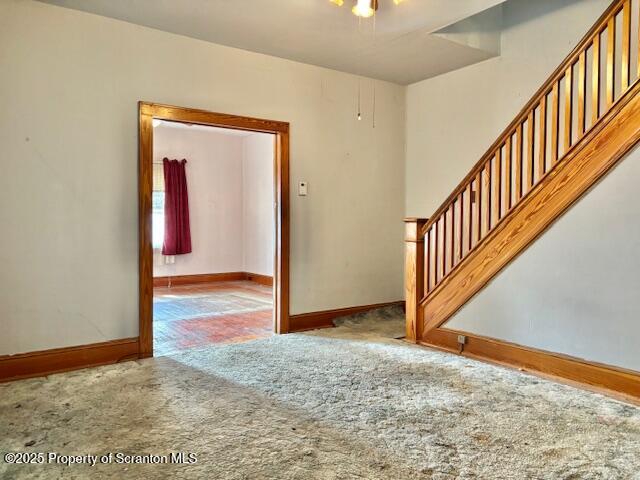 empty room featuring carpet flooring