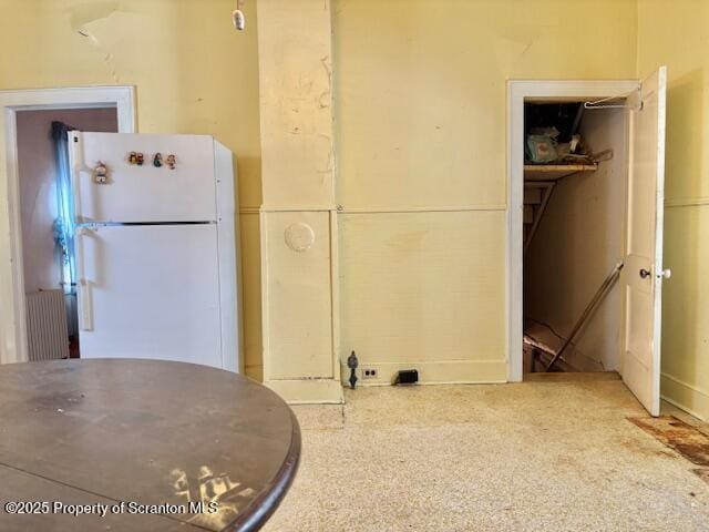 kitchen featuring white refrigerator