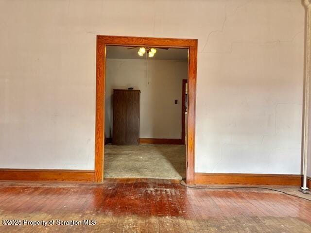 unfurnished room with hardwood / wood-style flooring