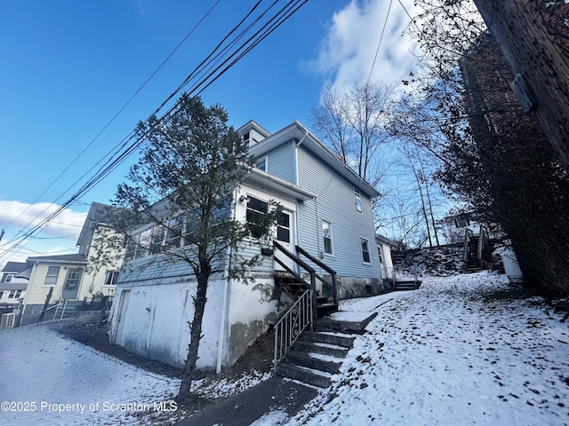 view of snow covered property