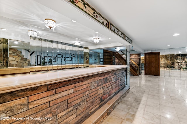 reception area with an inviting chandelier