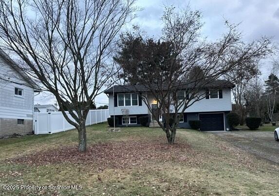 raised ranch with a garage