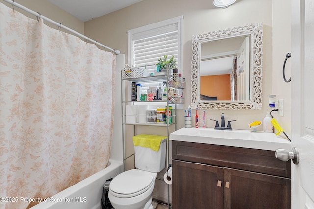 full bathroom with toilet, shower / bath combination with curtain, and vanity