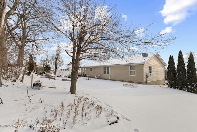 view of snow covered property