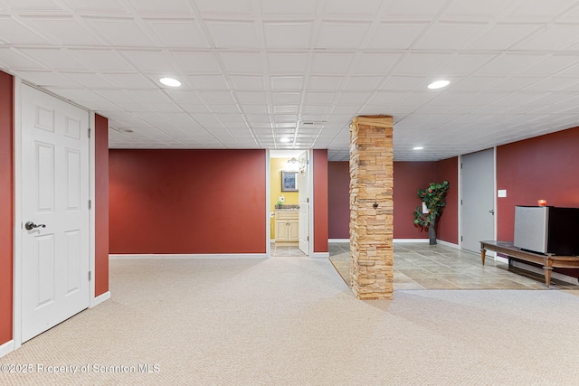 basement featuring carpet flooring