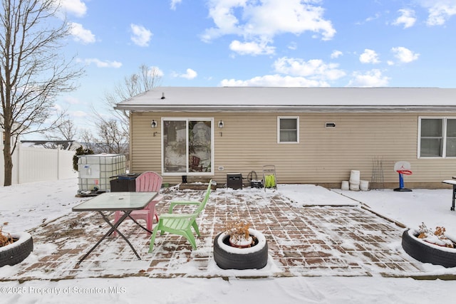 view of snow covered property