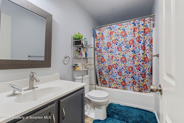 full bathroom with toilet, vanity, and shower / bath combination with curtain