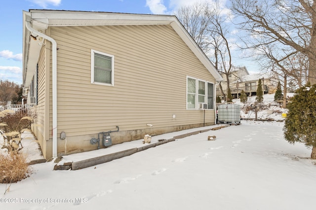 view of snow covered property