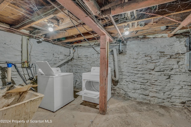 basement with washing machine and clothes dryer