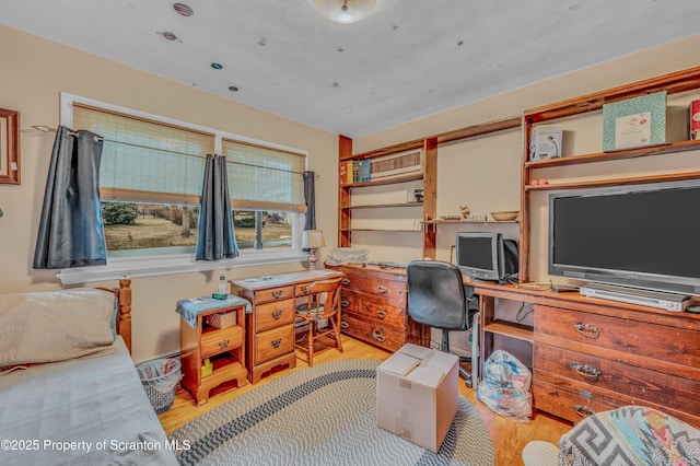 office space featuring light wood-style flooring