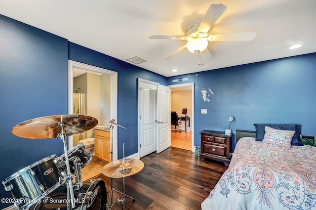 bedroom featuring ceiling fan and dark hardwood / wood-style flooring