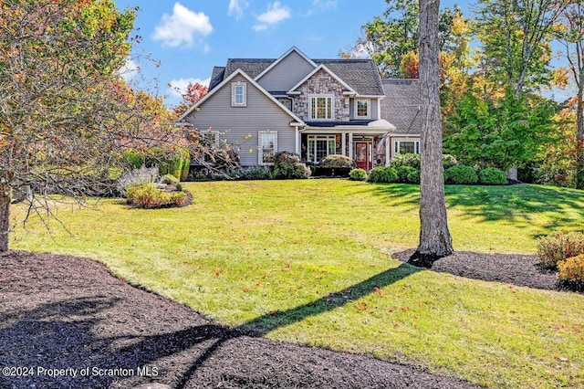 view of front of property with a front lawn