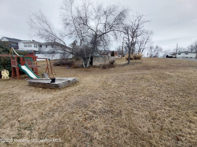 view of yard featuring a playground