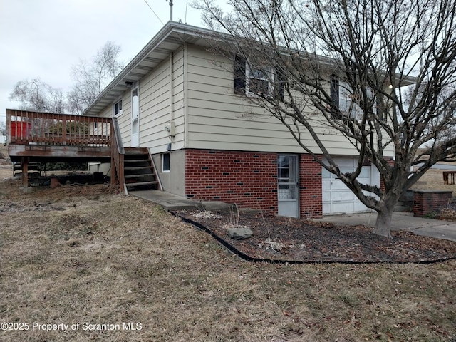 view of side of home featuring a deck