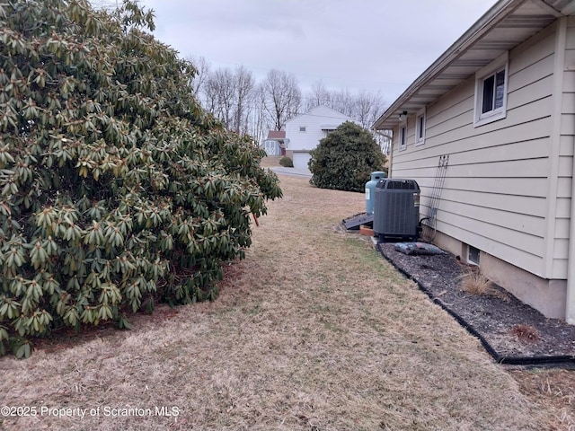 view of yard with central AC