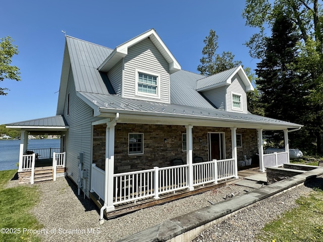185 Southpoint Rd, Montrose, PA 18801 - view of front of home featuring a porch, stone siding, and metal roof