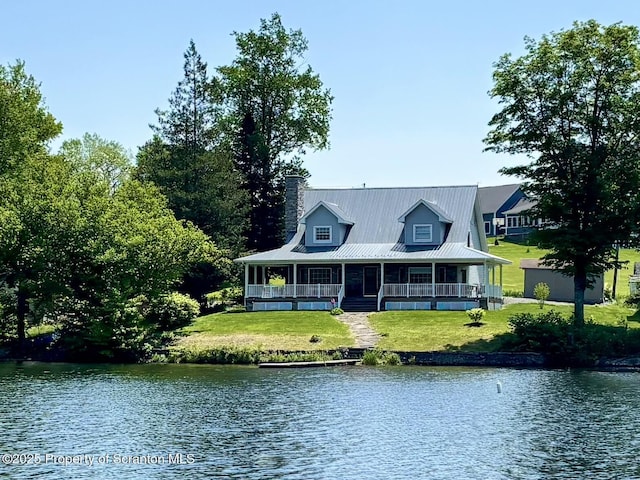 185 Southpoint Rd, Montrose, PA 18801 - back of house featuring a water view, a porch, a lawn, and a chimney