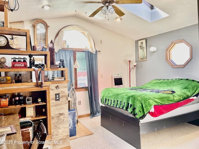 4886 State Route 11, Hop Bottom, PA 18824 - bedroom featuring tile patterned floors, heating unit, lofted ceiling with skylight, and baseboards