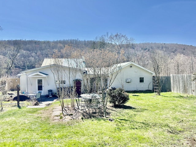 4886 State Route 11, Hop Bottom, PA 18824 - exterior space with a wooded view, a patio area, and fence