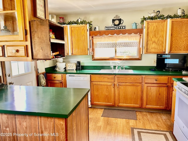 4886 State Route 11, Hop Bottom, PA 18824 - kitchen with white appliances, brown cabinetry, light wood-type flooring, open shelves, and a sink