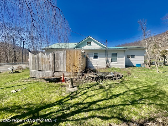 4886 State Route 11, Hop Bottom, PA 18824 - rear view of property featuring a yard