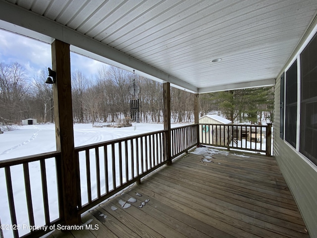 view of snow covered deck