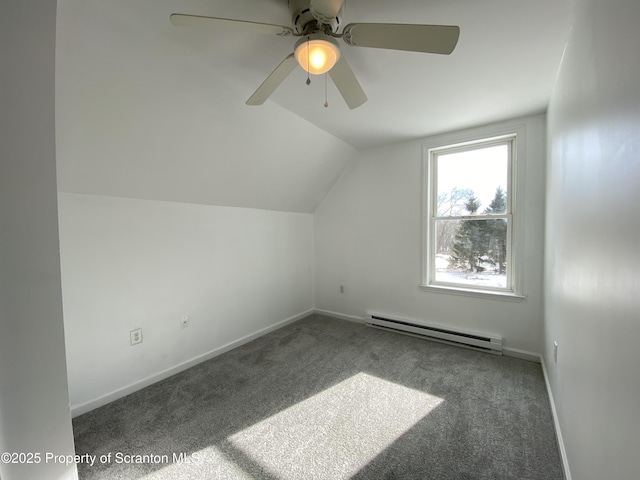 additional living space featuring lofted ceiling, carpet flooring, and baseboard heating