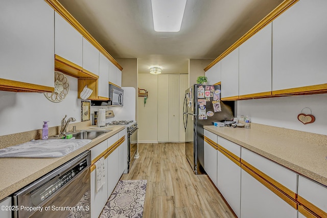1504 Summit Pt Unit 1504, Scranton, PA 18508 - kitchen featuring white gas range oven, black dishwasher, white cabinets, and light countertops