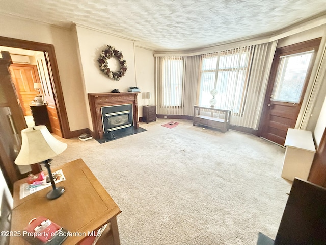 carpeted living area with a fireplace with flush hearth, baseboards, a textured ceiling, and ornamental molding