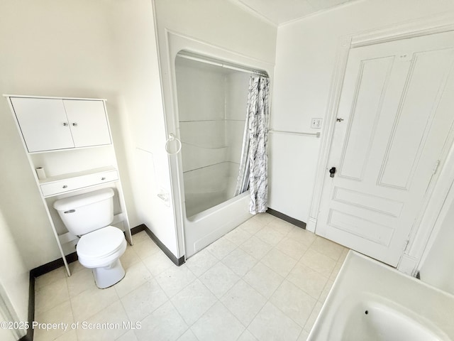 full bath with toilet, baseboards, shower / tub combo with curtain, and tile patterned floors