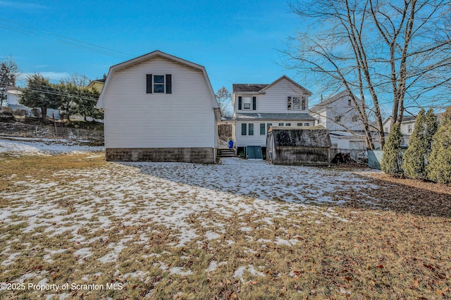 view of snow covered house