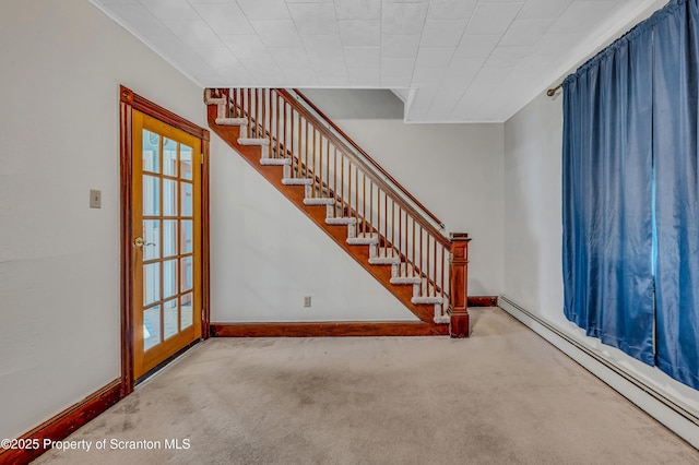 interior space featuring carpet floors and a baseboard radiator