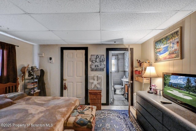 1223 Eynon St 1221, Scranton, PA 18504 - bedroom featuring a paneled ceiling and connected bathroom