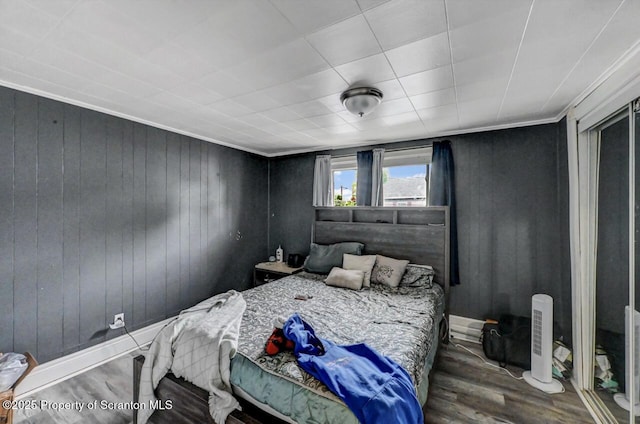 1223 Eynon St 1221, Scranton, PA 18504 - bedroom featuring wood finished floors and wood walls