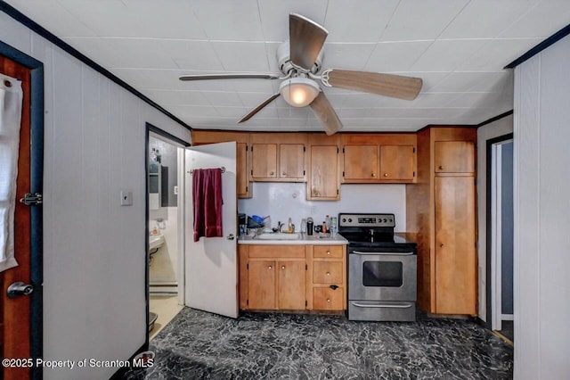 1223 Eynon St 1221, Scranton, PA 18504 - kitchen with stainless steel electric range oven, a ceiling fan, brown cabinetry, a sink, and light countertops