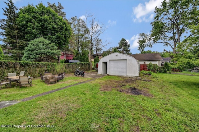 1223 Eynon St 1221, Scranton, PA 18504 - view of yard with an outdoor structure and a detached garage