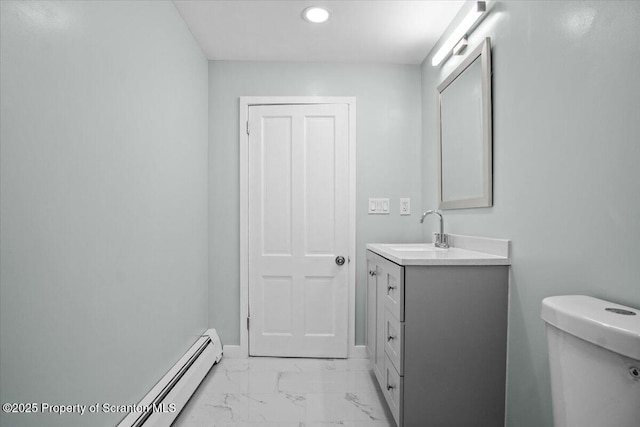 316 Sibley Ave, Old Forge, PA 18518 - bathroom with marble finish floors, vanity, a baseboard radiator, toilet, and recessed lighting