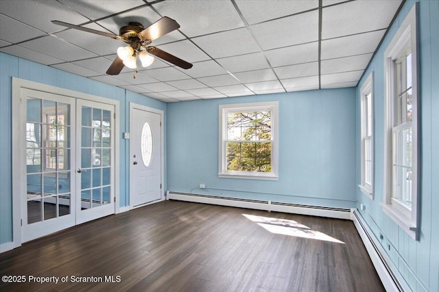 316 Sibley Ave, Old Forge, PA 18518 - entrance foyer featuring a baseboard heating unit, wood finished floors, and a ceiling fan